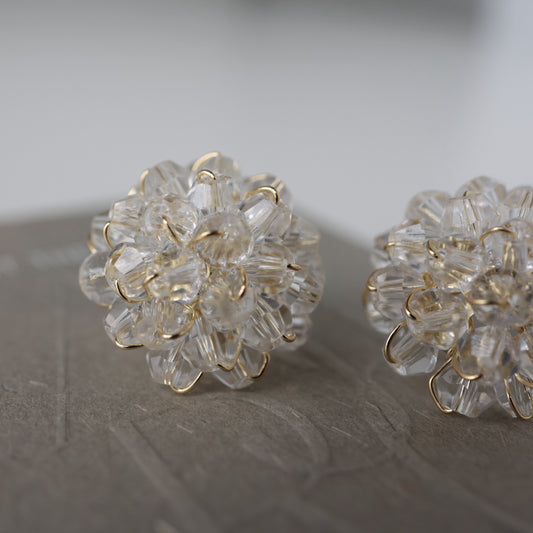 P209 clear flower bead pierce