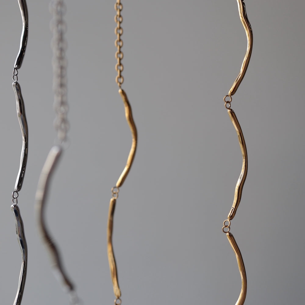 N057 stainless nuance wave necklace